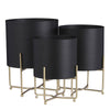 Lunar Noir Aries – zwarte metalen planters op gouden standaards